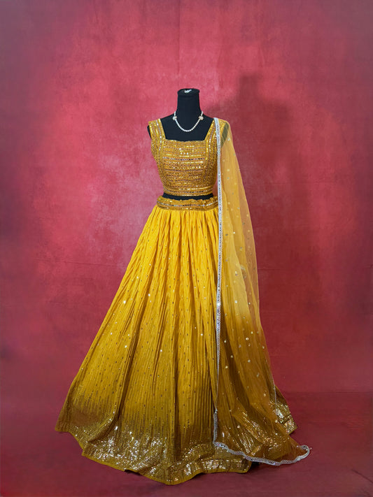 Radiant Yellow Georgette Lehenga with Gold Embellishments