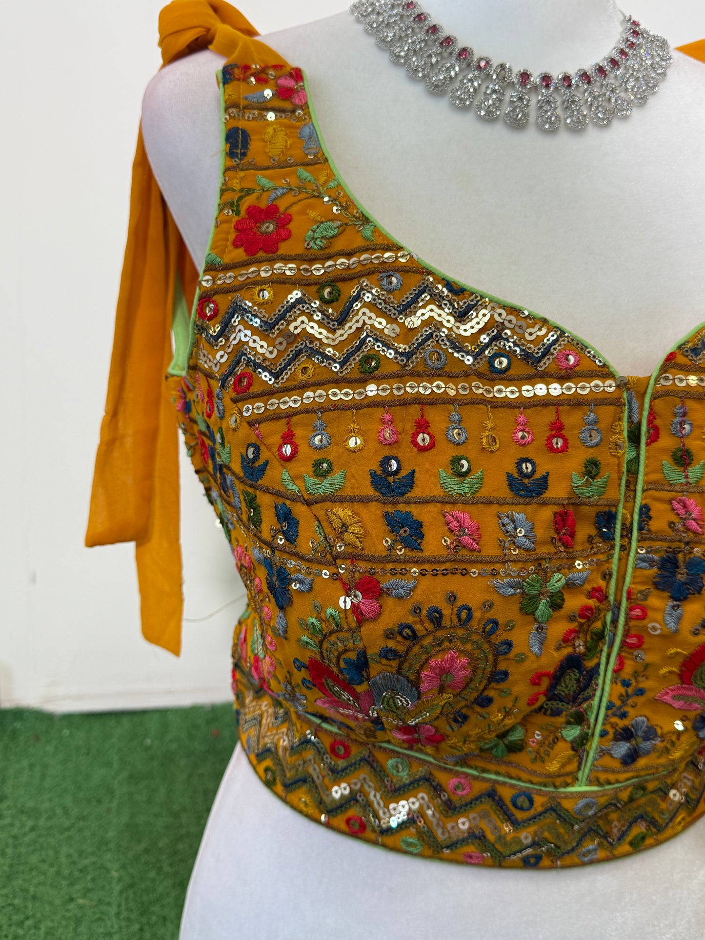 Mustard Yellow Rajasthani Georgette Sleeveless Blouse with Colorful Embroidery