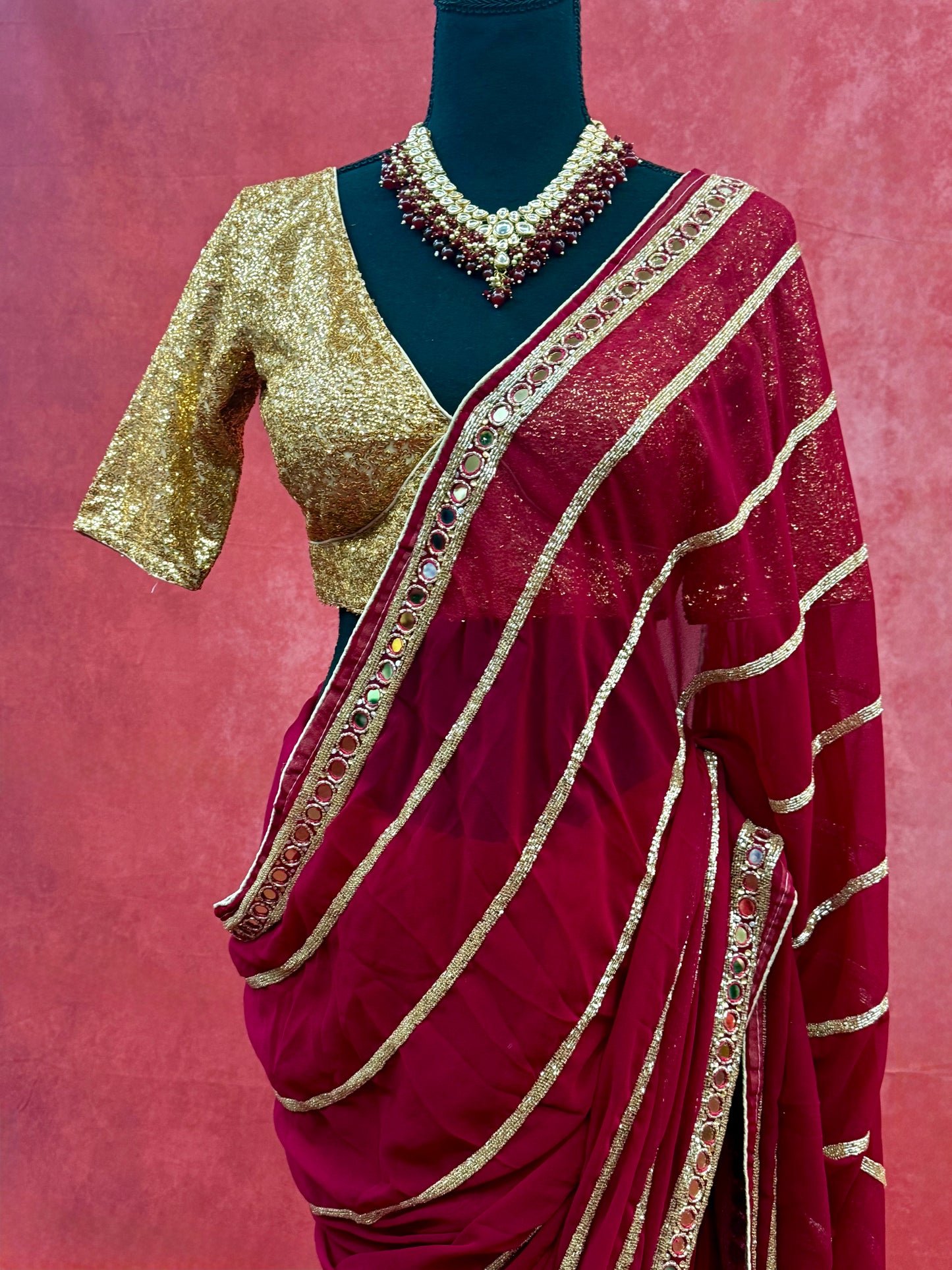 Maroon Chiffon Saree with Luxurious Gold Handwork