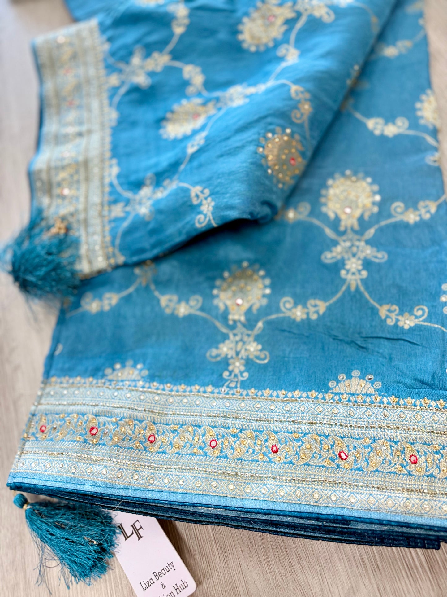 Pure Dola Silk Saree – Sky Blue with Elegant Handwork (Includes Stitched Blouse)