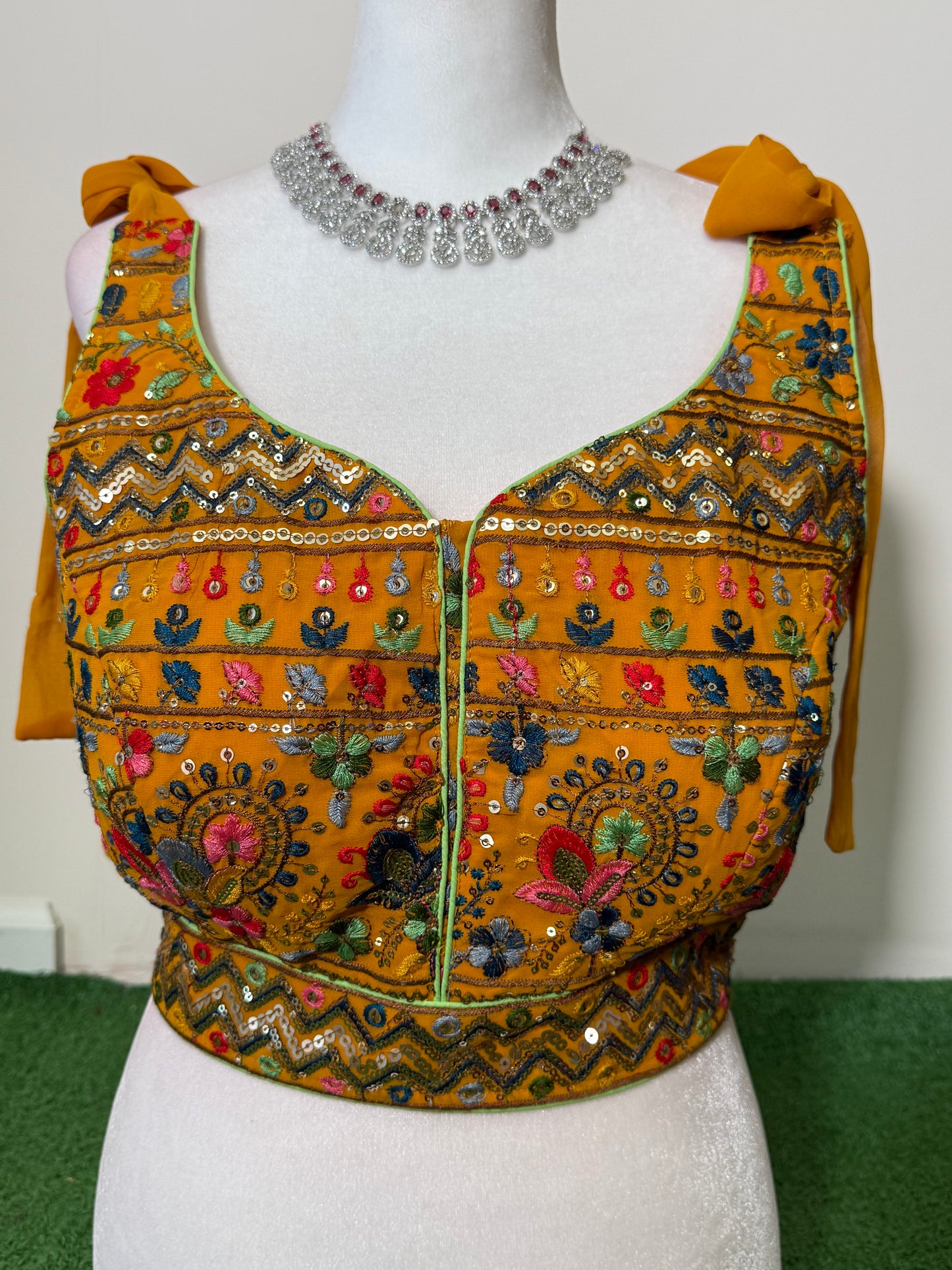 Mustard Yellow Rajasthani Georgette Sleeveless Blouse with Colorful Embroidery