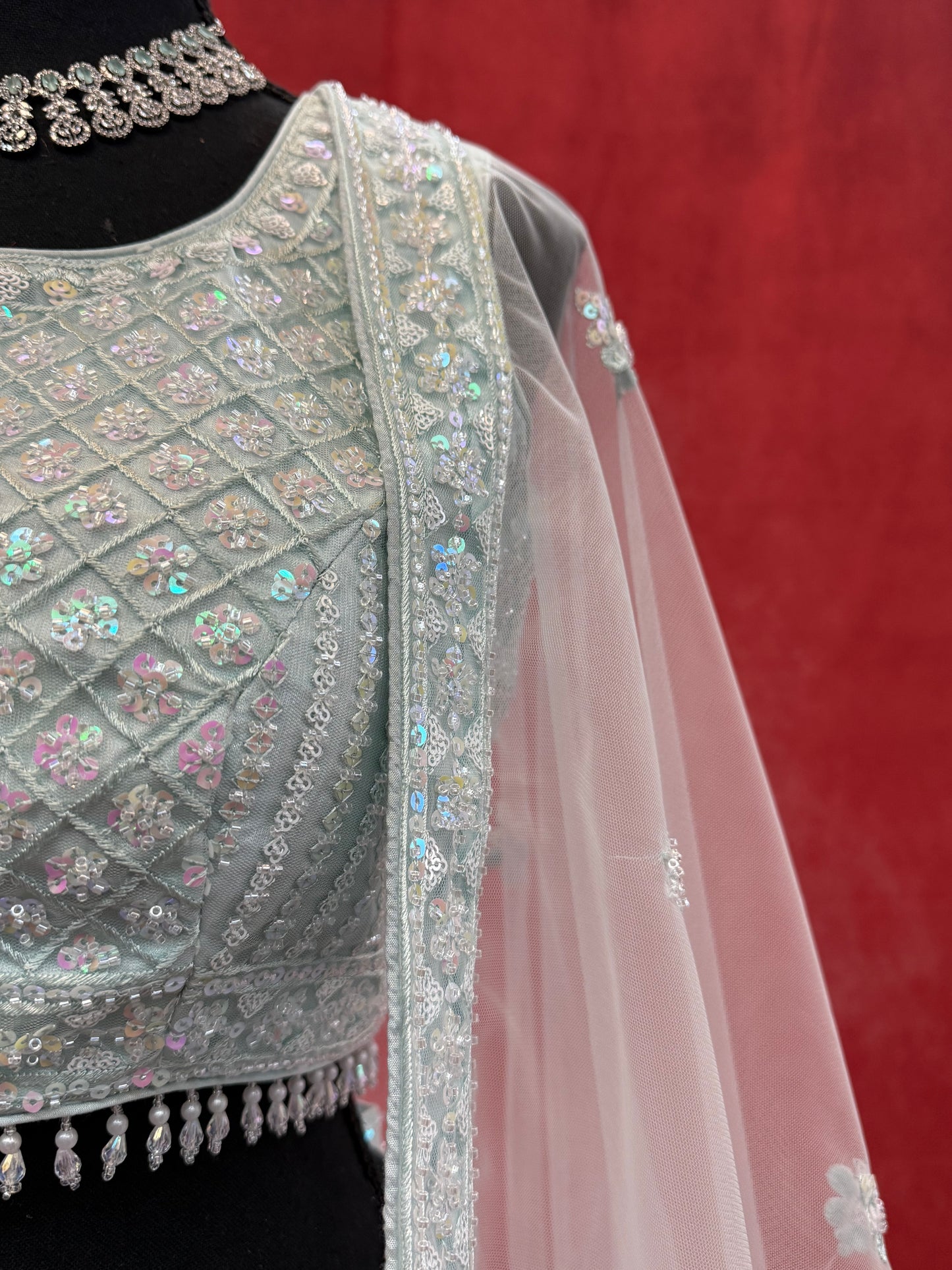 Light Teal Lehenga with Iridescent Sequins and White Embroidery (with attachable sleeve)